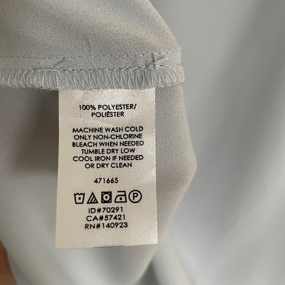 Lift Shoulder Button Ruffle Shell - Picture 2 of 5